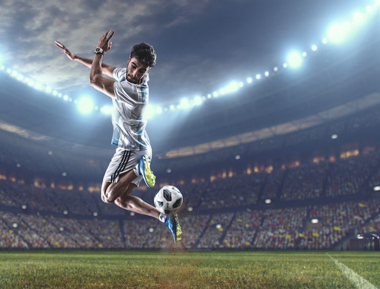 The adidas ball to be used at the world cup will house microchip technology allowing the speed and trajectory of the ball to be tracked and analysed. Here the player is wearing the official FIFA jersey for Argentina made by adidas.